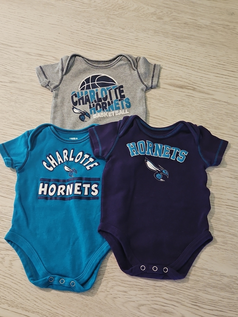 3 Pack Charlotte Hornets NBA Baby One-Piece Bodysuits - Teal, Purple, Gray